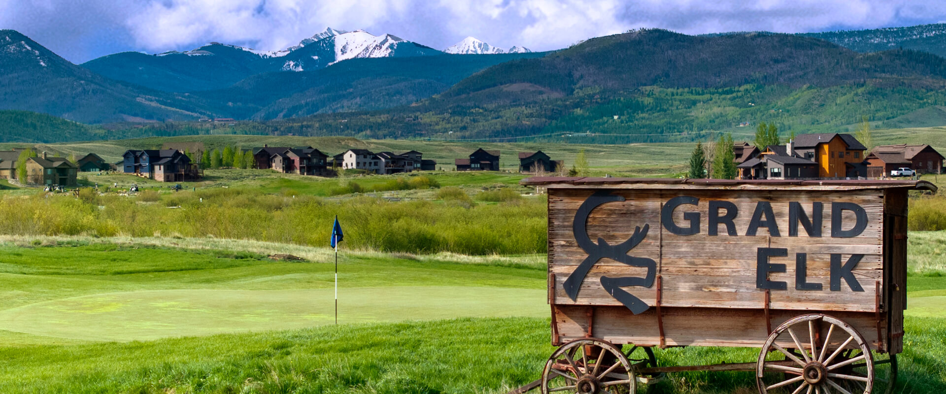Grand Elk carriage sign, golf course, homes and mountain view